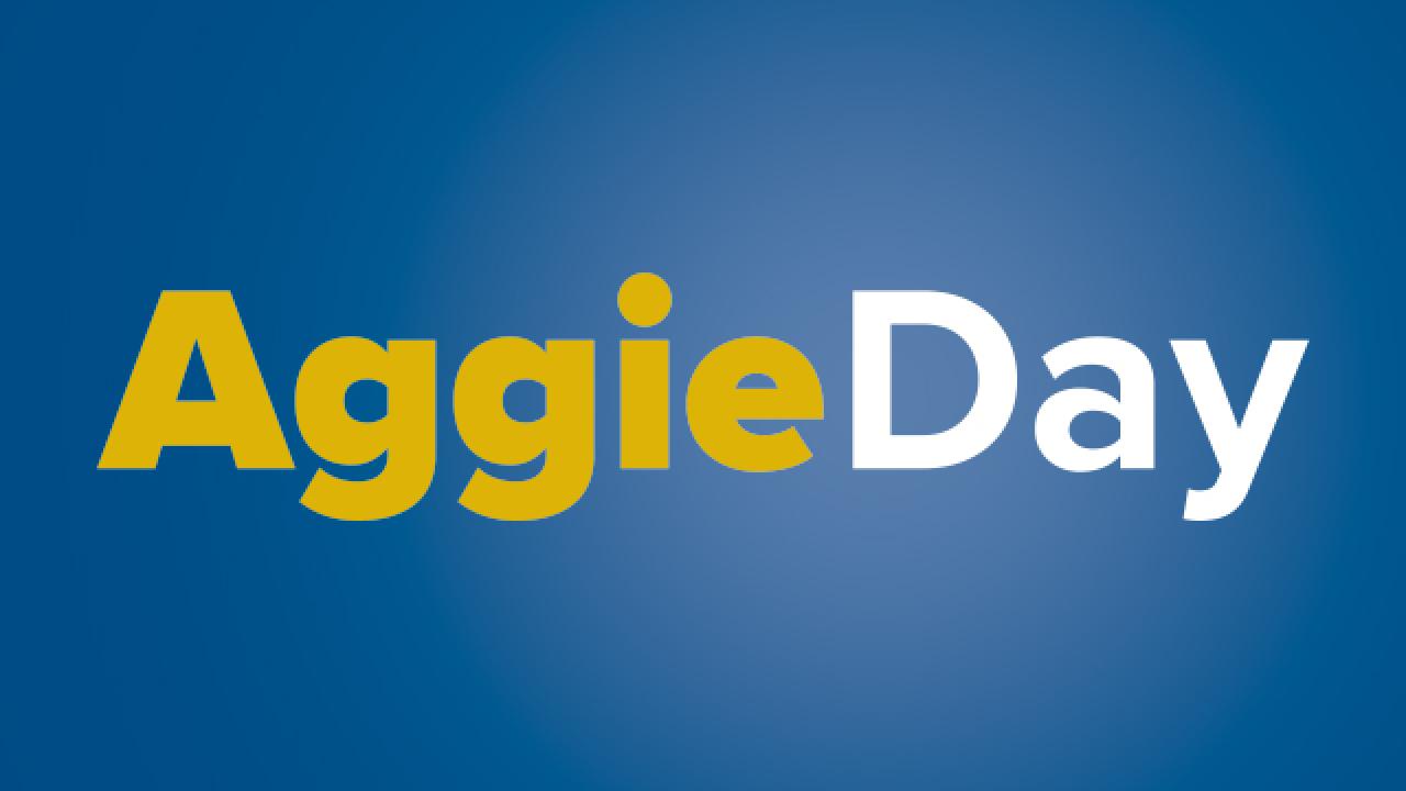 Aggie Day type against a blue background