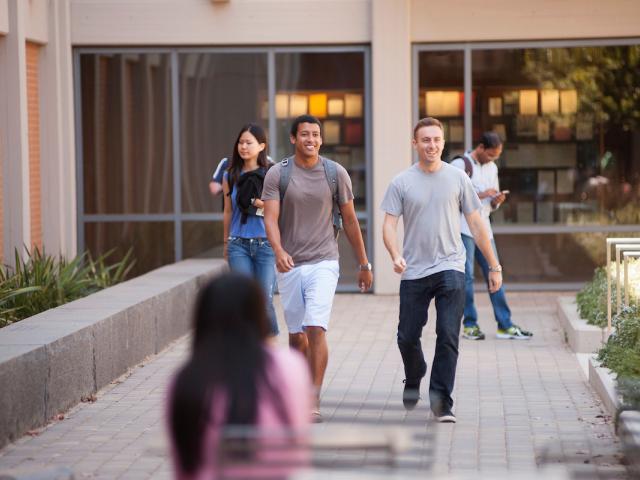 Students walking outside Law Library